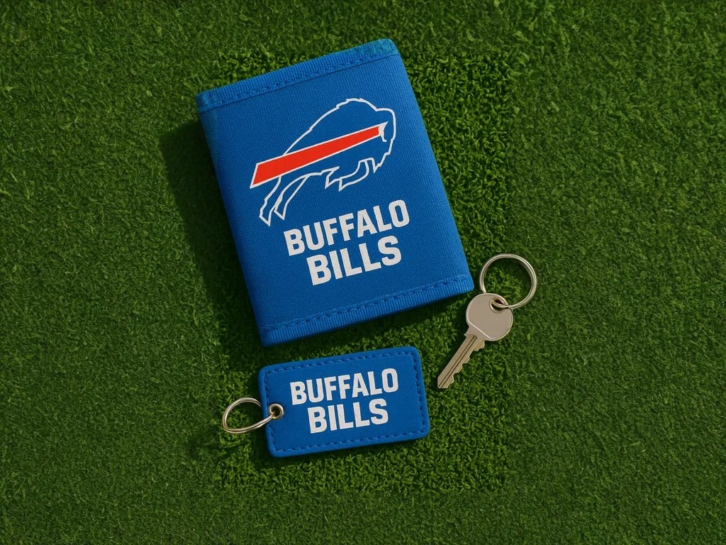 Buffalo Bills wallet, keychain, and key placed on green football turf background